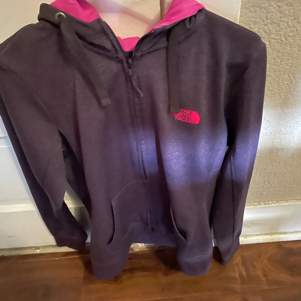 The North face sweatshirt full zipper very light weight. Spring/summer wear.